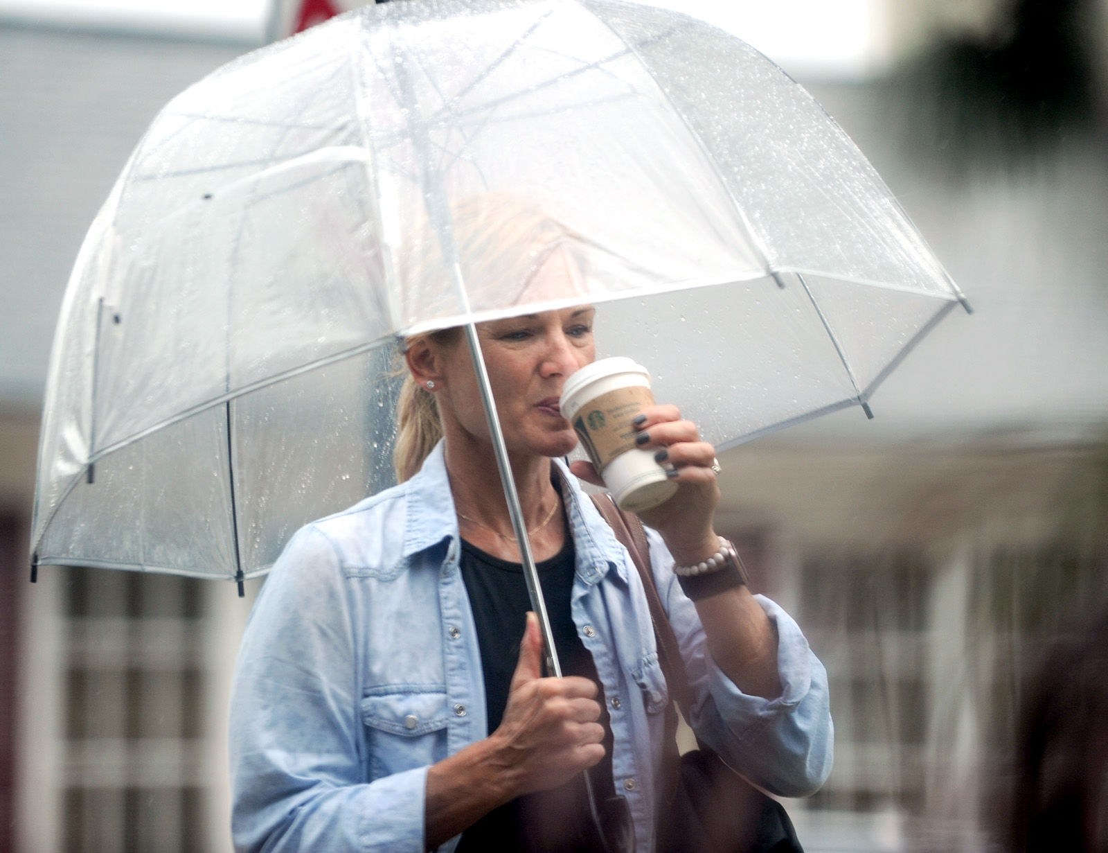A woman walks through downtown Southern Pines